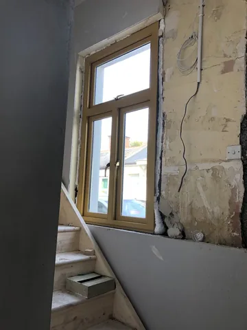New window fitted in a stripped stairwell